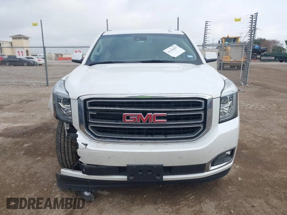 2019 GMC Yukon SLT with VIN 1GKS1BKCXKR329607, listed as a IAAI auction lot 41188239 with 84,940 mi miles. Bid and sale history available at carsss.com. Image 12.