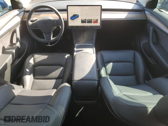 2022 Tesla Model 3 with VIN 5YJ3E1EA8NF322335, listed as a Copart auction lot 48187265 with 22,265 mi miles and Clean Title. Bid and sale history available at DreamBid. Image 8.