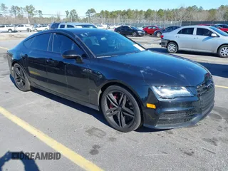 2015 Audi S7 with VIN WAUW2AFCXFN007946, listed as a IAAI auction lot 41364429 with 114,042 mi miles. Bid and sale history available at carsss.com. Image 1.