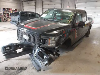 2019 Ford F-150 XL with VIN 1FTFW1E53KFC34426, listed as a IAAI auction lot 42040060 with 82,359 mi miles and . Bid and sale history available at carsss.com. Image 6.