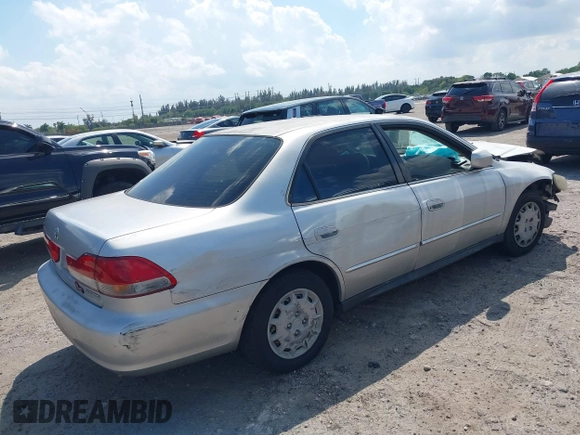 2002 Honda Accord LX z VIN JHMCG56462C005400, wystawiony jako IAAI lot #41893400 z przebiegiem Nie podano mil oraz . Historia ofert i sprzedaży dostępna na DreamBid. Obrazek 4.