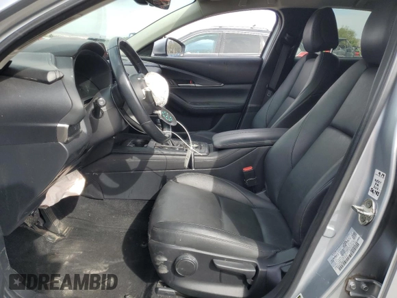 2021 Mazda CX-30 Select with VIN 3MVDMABLXMM256327, listed as a Copart auction lot 51185235 with 76,630 mi miles and Salvage Title. Bid and sale history available at DreamBid. Image 7.