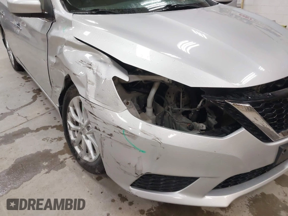 2019 Nissan Sentra S z VIN 3N1AB7AP7KY440764, wystawiony jako IAAI lot #41996693 z przebiegiem 34 594 mil mil oraz . Historia ofert i sprzedaży dostępna na DreamBid. Obrazek 6.