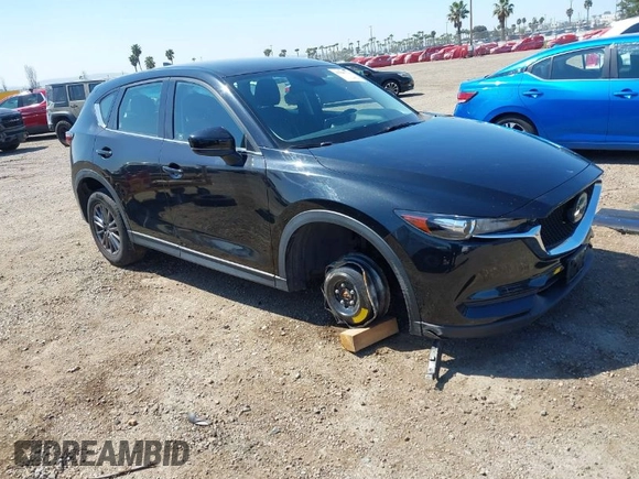 2020 Mazda CX-5 Sport with VIN JM3KFABM2L0761184, listed as a IAAI auction lot 41847768 with 47,582 mi miles. Bid and sale history available at carsss.com. Image 1.