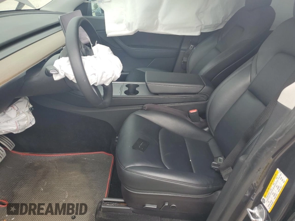 2022 Tesla Model Y Performance with VIN 7SAYGDEF2NF460730, listed as a Copart auction lot 54127945 with 59,735 mi miles and Salvage title. Bid and sale history available at DreamBid. Image 7.