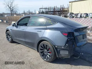 2023 Tesla Model Y Performance with VIN 7SAYGDEF7PF590750, listed as a IAAI auction lot 41694002 with Not Provided miles and . Bid and sale history available at DreamBid. Image 3.
