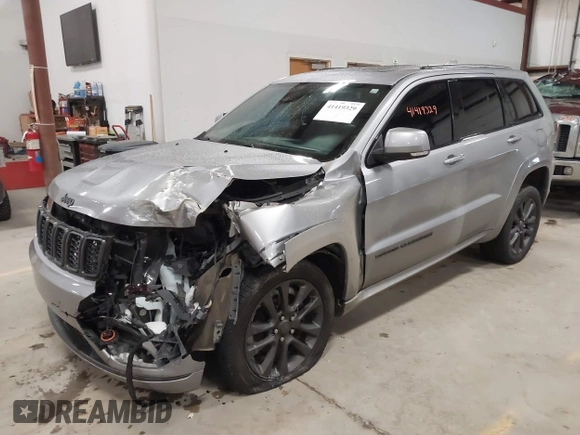 2018 Jeep Grand Cherokee High Altitude with VIN 1C4RJFCGXJC502580, listed as a IAAI auction lot 41419329 with 90,713 mi miles. Bid and sale history available at carsss.com. Image 17.