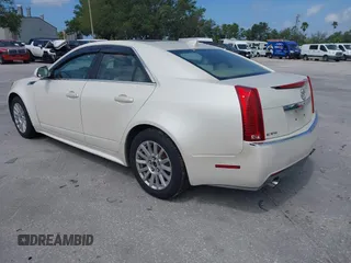 2010 Cadillac CTS Luxury with VIN 1G6DF5EG4A0131388, listed as a IAAI auction lot 41981168 with 124,065 mi miles. Bid and sale history available at carsss.com. Image 3.