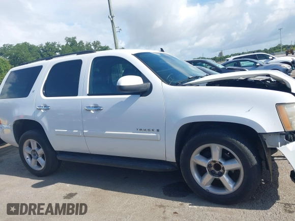 2007 Chevrolet Tahoe LT with VIN 1GNFC13J97R314853, listed as a IAAI auction lot 42684980 with 312,399 mi miles and . Bid and sale history available at DreamBid. Image 13.