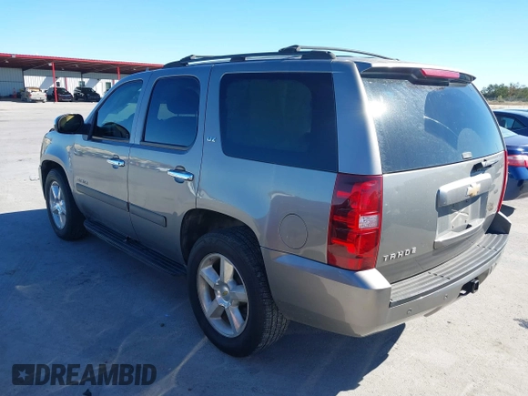 2007 Chevrolet Tahoe LTZ with VIN 1GNFC13J97R155705, listed as a IAAI auction lot 40914171 with 165,727 mi miles and . Bid and sale history available at DreamBid. Image 3.