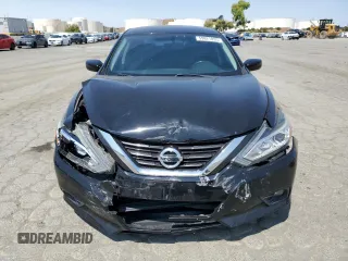 2017 Nissan Altima SV with VIN 1N4AL3APXHC206810, listed as a Copart auction lot 59821835 with 87,577 mi miles and Salvage title. Bid and sale history available at DreamBid. Image 5.