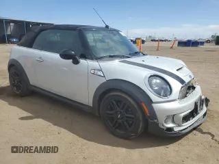 2015 MINI Convertible S z VIN WMWZP3C52FT298857, wystawiony jako Copart lot #58149145 z przebiegiem 52 777 mil mil oraz Szkoda całkowita • Salvage title. Historia ofert i sprzedaży dostępna na DreamBid. Obrazek 4.