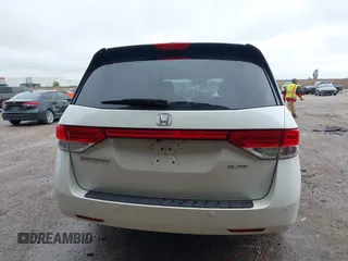 2014 Honda Odyssey Touring with VIN 5FNRL5H95EB059729, listed as a IAAI auction lot 42148110 with 135,304 mi miles and . Bid and sale history available at DreamBid. Image 17.