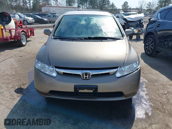 2006 Honda Civic LX with VIN 2HGFA16596H514483, listed as a IAAI auction lot 41889508 with 148,412 mi miles and . Bid and sale history available at DreamBid. Image 12.