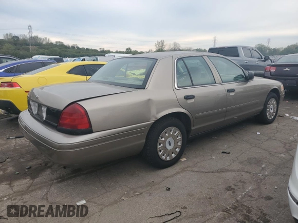 2004 Ford Police Interceptor Base w/3.27 Axle с VIN 2FAFP71W44X146769, выставлен на аукционе Copart как лот 73150654 с пробегом 149 106 миль миль и Списание • Salvage title. История ставок и продаж доступна на DreamBid. Изображение 3.