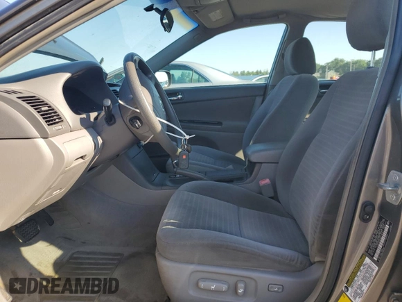 2006 Toyota Camry STD with VIN 4T1BE30K36U711539, listed as a Copart auction lot 65650005 with 135,763 mi miles and Salvage title. Bid and sale history available at DreamBid. Image 7.
