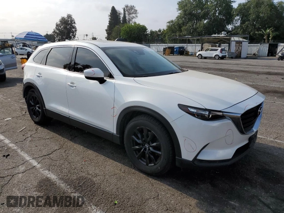 2016 Mazda CX-9 Touring with VIN JM3TCACY7G0110041, listed as a Copart auction lot 59218545 with 142,198 mi miles and Salvage title. Bid and sale history available at DreamBid. Image 4.