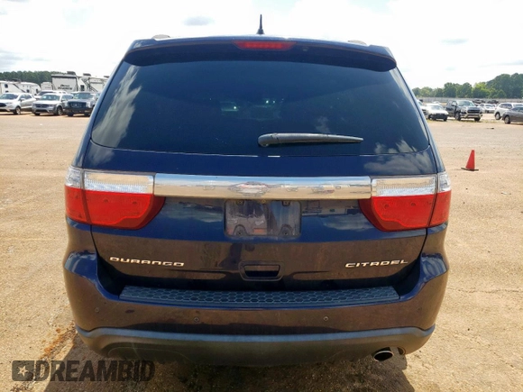 2013 Dodge Durango Citadel with VIN 1C4RDHEG1DC538744, listed as a Copart auction lot 64659785 with 185,850 mi miles and Salvage title. Bid and sale history available at DreamBid. Image 6.
