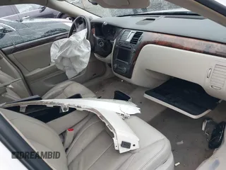 2010 Cadillac DTS 1SD z VIN 1G6KH5EYXAU121435, wystawiony jako IAAI lot #42175287 z przebiegiem Nie podano mil oraz . Historia ofert i sprzedaży dostępna na DreamBid. Obrazek 5.