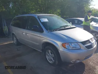 2005 Dodge Caravan SXT with VIN 2D4GP44LX5R540512, listed as a IAAI auction lot 42140912 with 259,855 mi miles and . Bid and sale history available at carsss.com. Image 1.