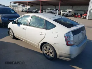 2008 Toyota Prius z VIN JTDKB20UX83457040, wystawiony jako IAAI lot #41626418 z przebiegiem 185 936 mil mil oraz . Historia ofert i sprzedaży dostępna na DreamBid. Obrazek 3.