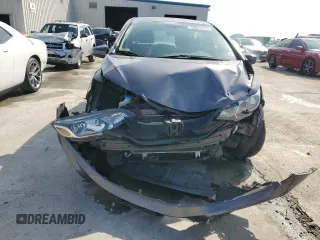 2015 Honda Fit LX с VIN 3HGGK5H59FM757797, выставлен на аукционе Copart как лот 58615175 с пробегом 109 608 миль миль и Списание • Salvage title. История ставок и продаж доступна на DreamBid. Изображение 5.