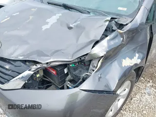 2013 Toyota Sienna LE AAS with VIN 5TDKK3DC0DS301315, listed as a IAAI auction lot 42215454 with 328,507 mi miles and . Bid and sale history available at DreamBid. Image 18.