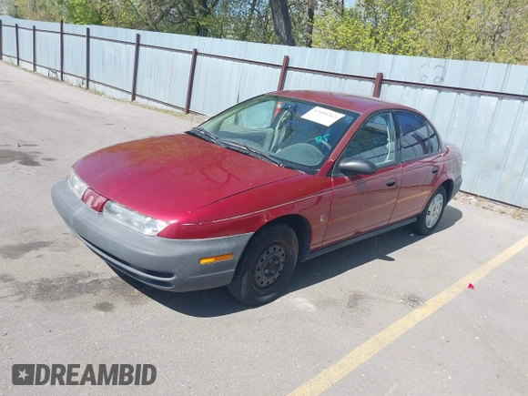 1996 Saturn SL with VIN 1G8ZG5289TZ214790, listed as a IAAI auction lot 42090262 with 197,485 mi miles. Bid and sale history available at carsss.com. Image 2.