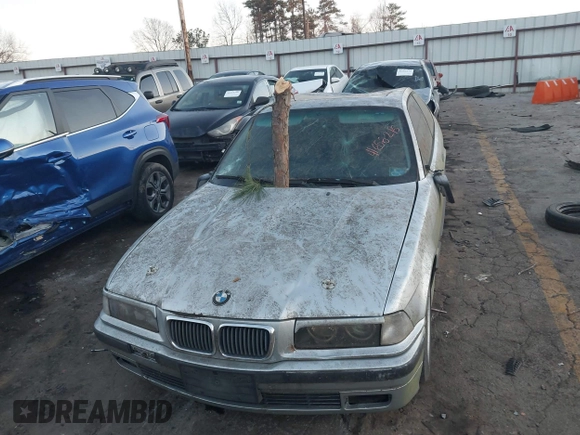 1998 BMW 3 Series 328is with VIN WBABG1329WET06968, listed as a IAAI auction lot 41656215 with 270,000 mi miles. Bid and sale history available at carsss.com. Image 12.