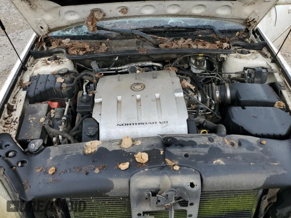 2004 Cadillac DeVille z VIN 1G6KD54Y24U186197, wystawiony jako Copart lot #54191045 z przebiegiem Nie podano mil oraz Szkody całkowita. Historia ofert i sprzedaży dostępna na DreamBid. Obrazek 11.