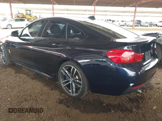 2018 BMW 4 Series 440i with VIN WBA4J5C50JBF07036, listed as a IAAI auction lot 41787949 with 68,821 mi miles and . Bid and sale history available at carsss.com. Image 3.