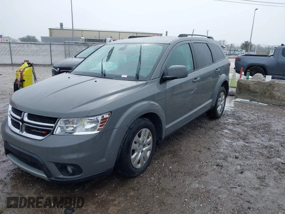 2019 Dodge Journey SE with VIN 3C4PDCBB2KT804440, listed as a IAAI auction lot 41333876 with 72,209 mi miles and . Bid and sale history available at DreamBid. Image 17.