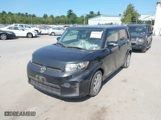 2011 Scion xB with VIN JTLZE4FE9B1118729, listed as a IAAI auction lot 40312454 with 129,260 mi miles. Bid and sale history available at carsss.com. Image 2.