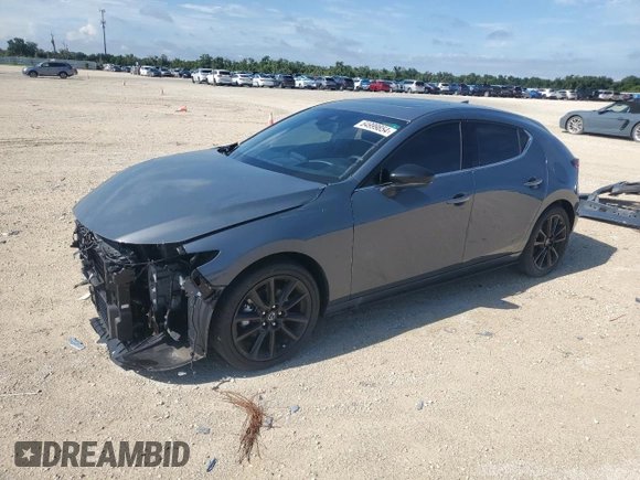 2023 Mazda 3 2.5 Turbo with VIN JM1BPBJY6P1618707, listed as a Copart auction lot 64999854 with 1,671 mi miles and Salvage title. Bid and sale history available at DreamBid. Image 1.