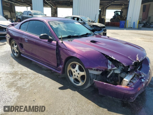 1997 Ford Mustang Cobra with VIN 1FALP47V0VF117976, listed as a Copart auction lot 72975454 with 165,076 mi miles and Salvage Title. Bid and sale history available at carsss.com. Image 4.