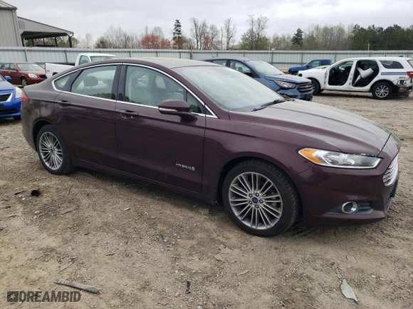 2013 Ford Fusion SE Hybrid with VIN 3FA6P0LU6DR338664, listed as a Copart auction lot 50202825 with 175,338 mi miles and Clean Title. Bid and sale history available at carsss.com. Image 4.