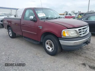 1999 Ford F-150 Work Series with VIN 1FTRF17W7XNA96857, listed as a IAAI auction lot 42119251 with 388,575 mi miles. Bid and sale history available at carsss.com. Image 1.