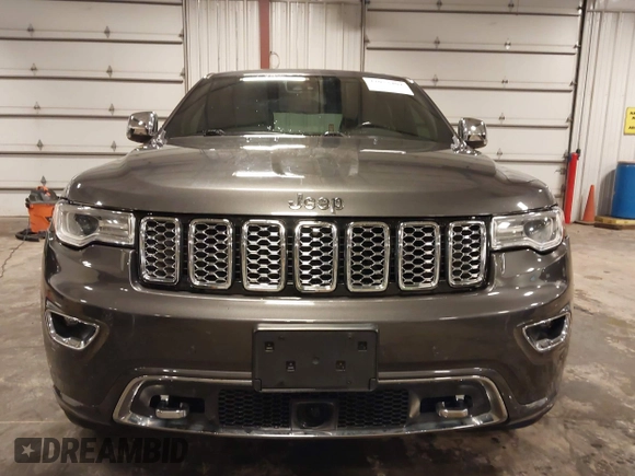 2017 Jeep Grand Cherokee Overland z VIN 1C4RJFCG6HC641812, wystawiony jako IAAI lot #42053404 z przebiegiem 129 184 mil mil oraz . Historia ofert i sprzedaży dostępna na DreamBid. Obrazek 12.