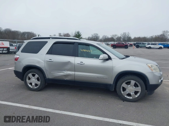 2007 GMC Acadia SLT with VIN 1GKEV23727J138899, listed as a IAAI auction lot 41984127 with 263,214 mi miles. Bid and sale history available at carsss.com. Image 6.