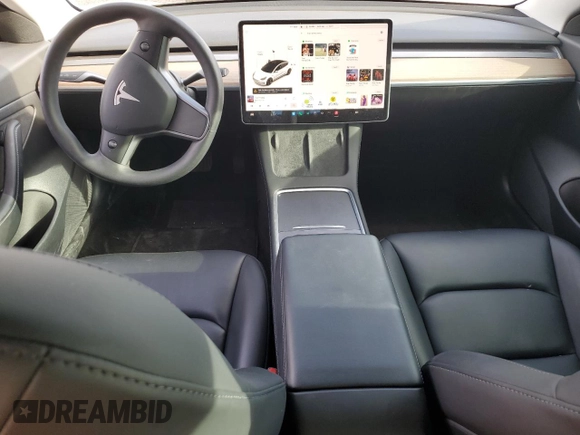 2021 Tesla Model 3 Standard Range Plus with VIN 5YJ3E1EA2MF923156, listed as a Copart auction lot 50098135 with 50,917 mi miles and Salvage Title. Bid and sale history available at carsss.com. Image 8.
