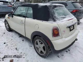 2010 MINI Convertible with VIN WMWMR3C50ATU97287, listed as a Copart auction lot 89116615 with 120,323 mi miles and Salvage Title. Bid and sale history available at DreamBid. Image 2.