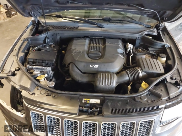 2015 Jeep Grand Cherokee Summit with VIN 1C4RJFJG4FC634129, listed as a IAAI auction lot 42481877 with 149,087 mi miles and . Bid and sale history available at DreamBid. Image 10.