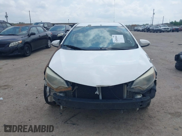 2016 Toyota Corolla L with VIN 5YFBURHE4GP401469, listed as a IAAI auction lot 42083642 with 204,258 mi miles and . Bid and sale history available at DreamBid. Image 12.