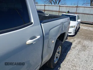 2017 Chevrolet Silverado 1500 LT with VIN 3GCUKREC3HG489701, listed as a IAAI auction lot 41814860 with 218,605 mi miles. Bid and sale history available at carsss.com. Image 6.