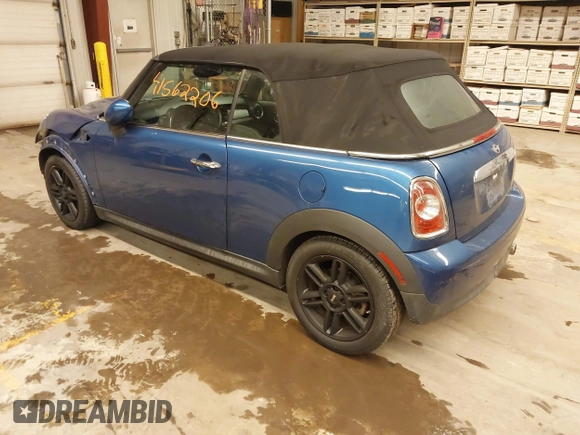 2015 MINI Convertible z VIN WMWZN3C58FT861657, wystawiony jako IAAI lot #41562206 z przebiegiem 135 524 mil mil oraz . Historia ofert i sprzedaży dostępna na DreamBid. Obrazek 3.