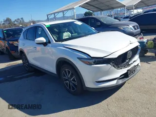 2018 Mazda CX-5 Grand Touring with VIN JM3KFADM5J1430541, listed as a IAAI auction lot 41861451 with 102,119 mi miles. Bid and sale history available at carsss.com. Image 1.