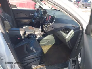 2015 Jeep Cherokee Limited with VIN 1C4PJMDS9FW718151, listed as a IAAI auction lot 41344018 with 124,185 mi miles and . Bid and sale history available at DreamBid. Image 5.