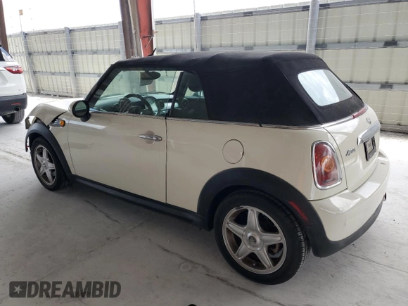 2010 MINI Convertible with VIN WMWMR3C59ATU98597, listed as a Copart auction lot 53336025 with 88,273 mi miles and Salvage Title. Bid and sale history available at DreamBid. Image 2.