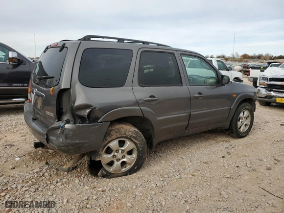 2003 Mazda Tribute LX with VIN 4F2YZ04173KM39426, listed as a Copart auction lot 82664104 with 0 mi miles and Salvage Title. Bid and sale history available at carsss.com. Image 3.