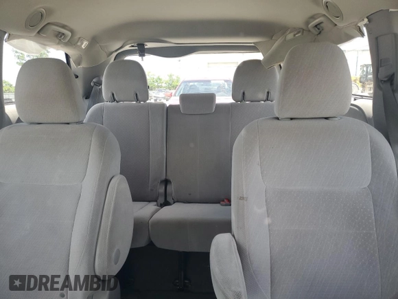 2015 Toyota Sienna LE with VIN 5TDJK3DC4FS107711, listed as a Copart auction lot 57693005 with 141,370 mi miles and Salvage title. Bid and sale history available at DreamBid. Image 10.